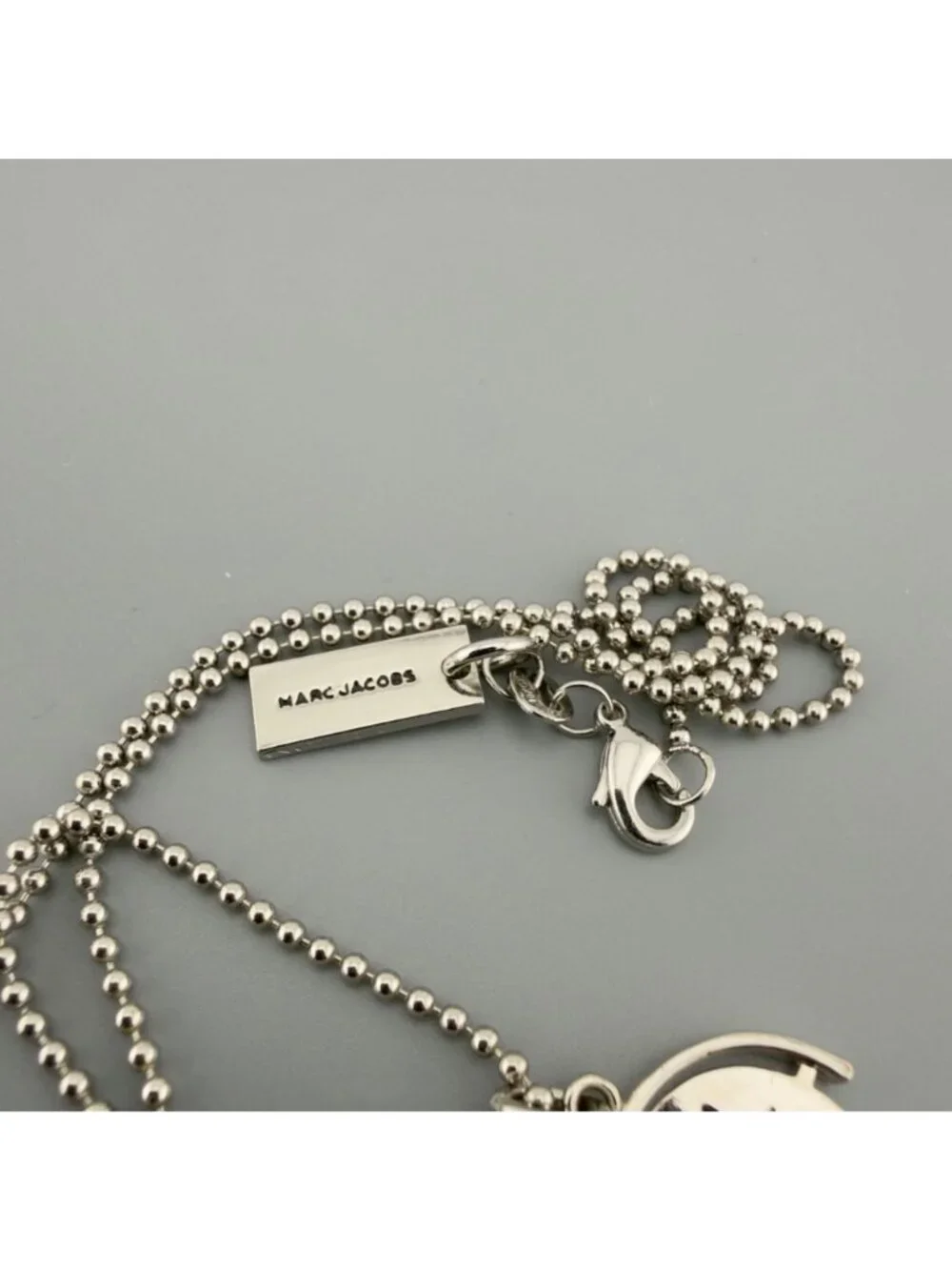 Marc Jacobs Spinner Pendant Charm Necklace P.S. I Love You Message Silver Tone